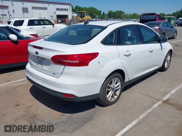 2017 Ford Focus SE with VIN 1FADP3F29HL234323, listed as a IAAI auction lot 42143821 with 138,860 mi miles. Bid and sale history available at carsss.com. Image 4.