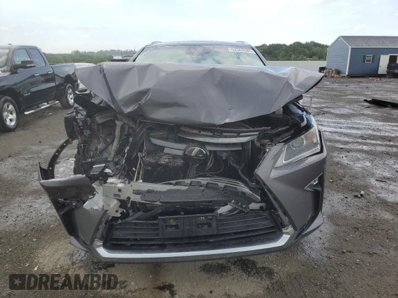2016 Lexus RX 350 z VIN 2T2BZMCA1GC010235, wystawiony jako Copart lot #62363585 z przebiegiem Nie podano mil oraz Szkoda całkowita • Salvage title. Historia ofert i sprzedaży dostępna na DreamBid. Obrazek 5.