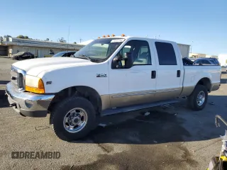 2000 Ford Super Duty F-250 XL with VIN 1FTNW21S1YED65639, listed as a Copart auction lot 74377194 with 158,387 mi miles and Salvage Title. Bid and sale history available at carsss.com. Image 1.