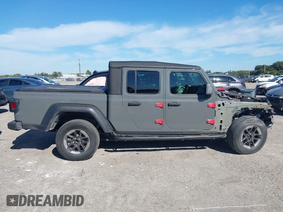 2021 Jeep Gladiator Willys with VIN 1C6HJTAG4ML517715, listed as a IAAI auction lot 41436634 with 21,187 mi miles and . Bid and sale history available at DreamBid. Image 13.