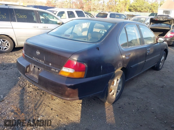 1999 Nissan Altima XE with VIN 1N4DL01D1XC193705, listed as a IAAI auction lot 40880059 with 183,605 mi miles. Bid and sale history available at carsss.com. Image 4.