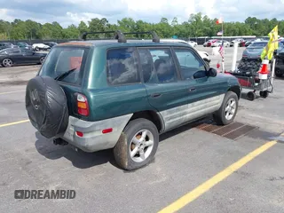 1999 Toyota RAV4 with VIN JT3GP10V4X7052720, listed as a IAAI auction lot 42490948 with 321,165 mi miles and . Bid and sale history available at DreamBid. Image 4.