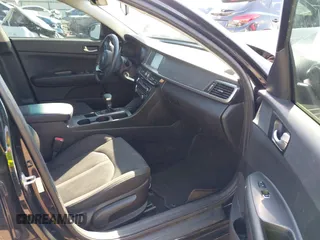 2018 Kia Optima LX with VIN 5XXGT4L36JG264505, listed as a IAAI auction lot 41888652 with 133,596 mi miles. Bid and sale history available at carsss.com. Image 5.