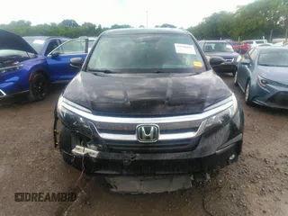 2021 Honda Pilot EX-L with VIN 5FNYF5H50MB011165, listed as a IAAI auction lot 39799892 with 95,040 mi miles and . Bid and sale history available at DreamBid. Image 12.