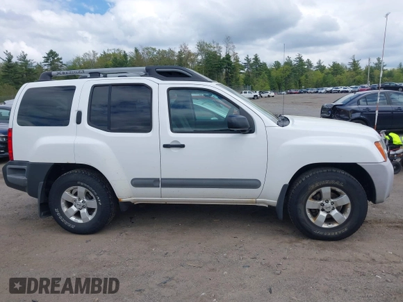 2011 Nissan Xterra S with VIN 5N1AN0NW2BC516828, listed as a IAAI auction lot 42251064 with 212,470 mi miles and . Bid and sale history available at DreamBid. Image 13.