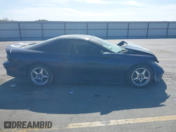 2001 Chevrolet Camaro Z28 z VIN 2G1FP22G312146719, wystawiony jako IAAI lot #42228792 z przebiegiem 134 142 mil mil oraz . Historia ofert i sprzedaży dostępna na DreamBid. Obrazek 13.