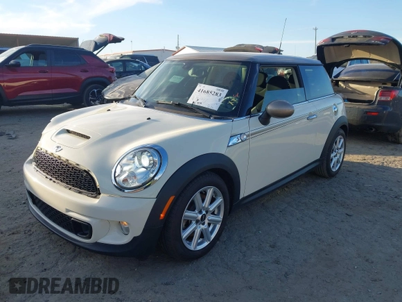 2013 MINI Hardtop S with VIN WMWSV3C53DT479714, listed as a IAAI auction lot 41685283 with 61,904 mi miles and . Bid and sale history available at DreamBid. Image 2.