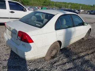 2003 Honda Civic LX with VIN 1HGES16523L014348, listed as a IAAI auction lot 42015881 with 271,832 mi miles. Bid and sale history available at carsss.com. Image 4.