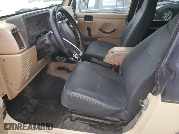 2001 Jeep Wrangler Sport с VIN 1J4FA49S71P312113, выставлен на аукционе Copart как лот 51168125 с пробегом 120 683 миль миль и Списание • Salvage title. История ставок и продаж доступна на DreamBid. Изображение 7.