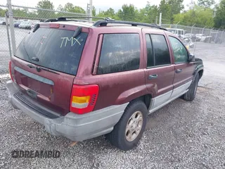 2000 Jeep Grand Cherokee Laredo with VIN 1J4G248S0YC351033, listed as a IAAI auction lot 42165830 with 145,351 mi miles and . Bid and sale history available at DreamBid. Image 4.