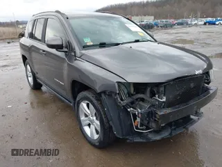 2015 Jeep Compass Latitude with VIN 1C4NJDEB6FD217929, listed as a IAAI auction lot 41655409 with 137,682 mi miles. Bid and sale history available at carsss.com. Image 1.