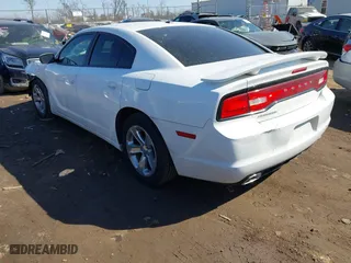 2011 Dodge Charger SE with VIN 2B3CL3CG7BH590244, listed as a IAAI auction lot 41776619 with 114,572 mi miles. Bid and sale history available at carsss.com. Image 3.