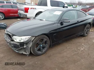 2014 BMW 4 Series 428i with VIN WBA3N7C50EF718339, listed as a IAAI auction lot 41403096 with 143,478 mi miles and . Bid and sale history available at carsss.com. Image 2.