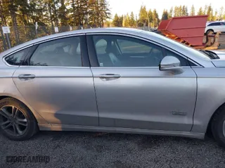 2015 Ford Fusion Energi Titanium with VIN 3FA6P0SU8FR264846, listed as a IAAI auction lot 41552443 with 160,142 mi miles. Bid and sale history available at carsss.com. Image 13.