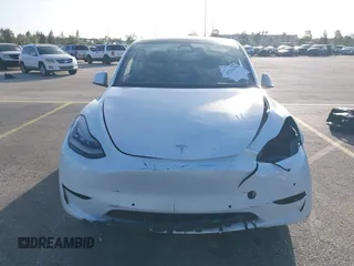 2021 Tesla Model Y Standard Range with VIN 5YJYGDED3MF103650, listed as a IAAI auction lot 41726278 with Not Provided miles and . Bid and sale history available at DreamBid. Image 11.