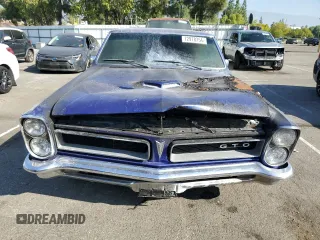 1965 Pontiac GTO z VIN 237375Z113429, wystawiony jako Copart lot #72978754 z przebiegiem Nie podano mil oraz Szkoda całkowita • Salvage title. Historia ofert i sprzedaży dostępna na DreamBid. Obrazek 5.