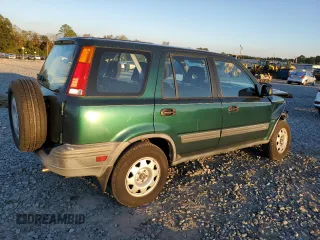 2000 Honda CR-V LX with VIN JHLRD1848YC038520, listed as a Copart auction lot 74137634 with 104,332 mi miles and Salvage Title. Bid and sale history available at carsss.com. Image 3.