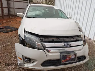 2012 Ford Fusion SE z VIN 3FAHP0HA3CR285217, wystawiony jako IAAI lot #41792353 z przebiegiem 190 916 mil mil oraz . Historia ofert i sprzedaży dostępna na DreamBid. Obrazek 12.
