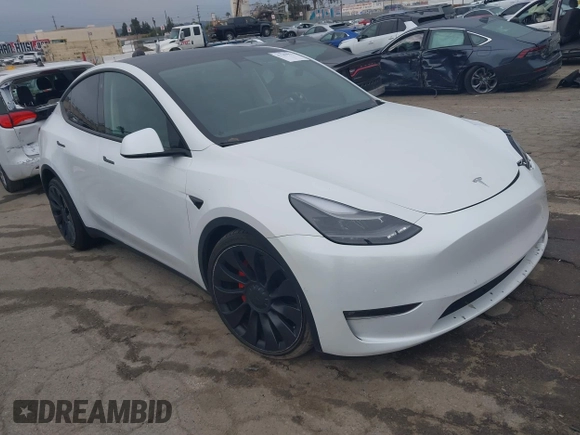 2022 Tesla Model Y Performance with VIN 7SAYGDEF0NF400560, listed as a IAAI auction lot 41783912 with 36,513 mi miles and . Bid and sale history available at DreamBid. Image 1.