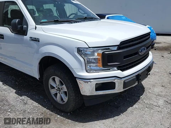 2018 Ford F-150 XL with VIN 1FTEW1E55JFC60004, listed as a Copart auction lot 59730015 with 165,784 mi miles and Non repairable. Bid and sale history available at DreamBid. Image 13.
