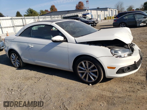 2015 Volkswagen Eos Komfort with VIN WVWBW8AH1FV000692, listed as a Copart auction lot 77866694 with 114,156 mi miles and Salvage Title. Bid and sale history available at DreamBid. Image 4.