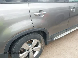 2013 Kia Sorento EX z VIN 5XYKUDA61DG321679, wystawiony jako IAAI lot #42013051 z przebiegiem Nie podano mil oraz . Historia ofert i sprzedaży dostępna na DreamBid. Obrazek 6.