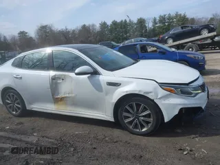 2019 Kia Optima LX with VIN 5XXGT4L38KG300213, listed as a IAAI auction lot 41775052 with 141,402 mi miles. Bid and sale history available at carsss.com. Image 13.