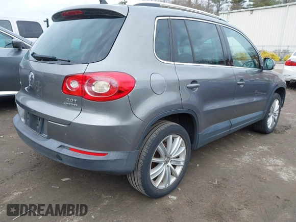 2011 Volkswagen Tiguan SE with VIN WVGBV7AX4BW532524, listed as a IAAI auction lot 41757552 with 141,115 mi miles and . Bid and sale history available at DreamBid. Image 4.