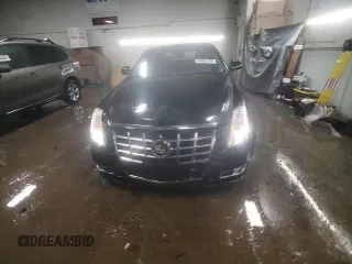 2013 Cadillac CTS Premium z VIN 1G6DS5E3XD0160729, wystawiony jako Copart lot #44633195 z przebiegiem 74 697 mil mil oraz Szkoda całkowita • Salvage title. Historia ofert i sprzedaży dostępna na DreamBid. Obrazek 13.