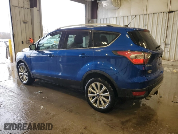 2017 Ford Escape Titanium with VIN 1FMCU9JD2HUB41143, listed as a Copart auction lot 52206015 with 126,277 mi miles and Non Repairable. Bid and sale history available at carsss.com. Image 2.