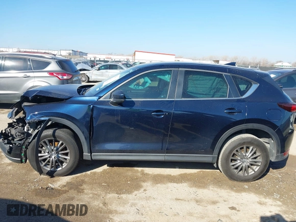 2017 Mazda CX-5 Touring with VIN JM3KFACL1H0192549, listed as a IAAI auction lot 41667781 with 89,030 mi miles. Bid and sale history available at carsss.com. Image 14.