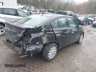 2016 Nissan Versa SV with VIN 3N1CN7AP4GL831357, listed as a IAAI auction lot 41730415 with 102,178 mi miles. Bid and sale history available at carsss.com. Image 4.