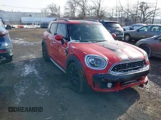 2019 MINI Countryman Cooper S with VIN WMZYT5C57K3E69637, listed as a IAAI auction lot 41379982 with 100,891 mi miles. Bid and sale history available at carsss.com. Image 1.