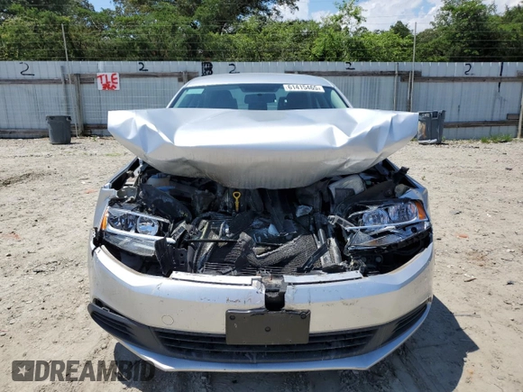 2014 Volkswagen Jetta S with VIN 3VW2K7AJ3EM227817, listed as a Copart auction lot 61415465 with 121,248 mi miles and Salvage title. Bid and sale history available at DreamBid. Image 5.