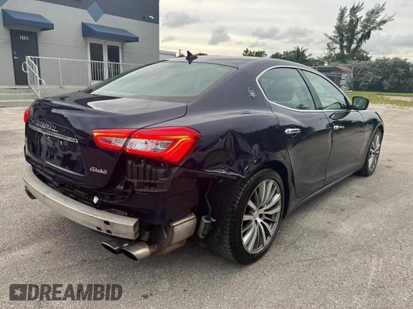 2015 Maserati Ghibli z VIN ZAM57XSA2F1159438, wystawiony jako Copart lot #49187735 z przebiegiem 73 996 mil mil oraz Szkoda całkowita • Salvage title. Historia ofert i sprzedaży dostępna na DreamBid. Obrazek 3.