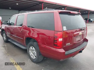 2011 Chevrolet Suburban LT with VIN 1GNSCJE07BR323241, listed as a IAAI auction lot 41548258 with 262,547 mi miles. Bid and sale history available at carsss.com. Image 3.