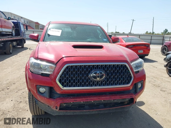 2018 Toyota Tacoma SR5 with VIN 5TFAZ5CN0JX063350, listed as a IAAI auction lot 41829396 with 61,155 mi miles and . Bid and sale history available at DreamBid. Image 13.
