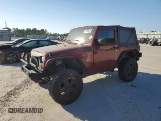 2008 Jeep Wrangler Sahara z VIN 1J4FA54148L610723, wystawiony jako Copart lot #52085525 z przebiegiem 158 057 mil mil oraz Czysty tytuł • Clean title. Historia ofert i sprzedaży dostępna na DreamBid. Obrazek 1.