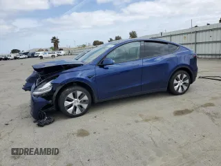 2020 Tesla Model Y Long Range z VIN 5YJYGDEEXLF014178, wystawiony jako Copart lot #54579385 z przebiegiem 49 808 mil mil oraz Szkoda całkowita • Salvage title. Historia ofert i sprzedaży dostępna na DreamBid. Obrazek 1.