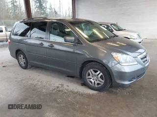 2007 Honda Odyssey EX with VIN 5FNRL38417B054717, listed as a IAAI auction lot 41955733 with 157,076 mi miles. Bid and sale history available at carsss.com. Image 1.