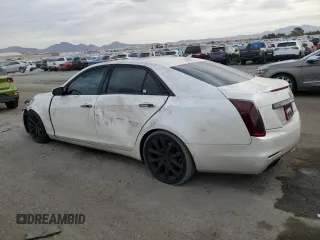 2014 Cadillac CTS Premium RWD z VIN 1G6AT5S30E0142990, wystawiony jako Copart lot #50801685 z przebiegiem 74 583 mil mil oraz Szkody całkowita. Historia ofert i sprzedaży dostępna na DreamBid. Obrazek 2.