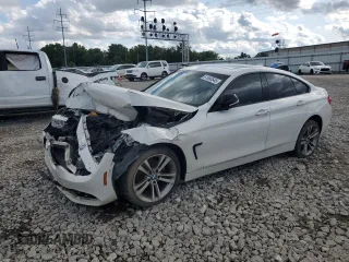 2015 BMW 4 Series 428i xDrive z VIN WBA4A7C53FD415066, wystawiony jako Copart lot #61880545 z przebiegiem 130 874 mil mil oraz Szkoda całkowita • Salvage title. Historia ofert i sprzedaży dostępna na DreamBid. Obrazek 1.