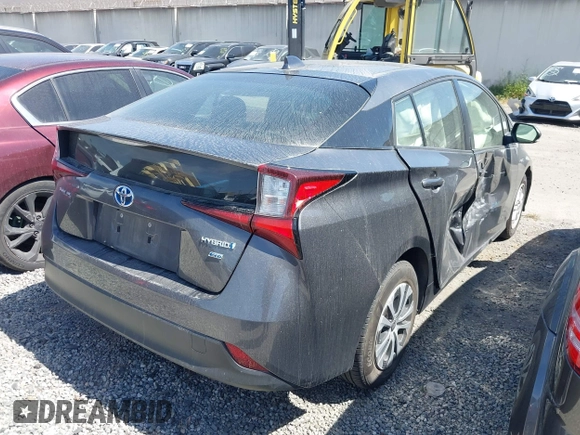2022 Toyota Prius L Eco with VIN JTDKAMFU7N3154041, listed as a IAAI auction lot 41896210 with 46,382 mi miles and . Bid and sale history available at DreamBid. Image 4.