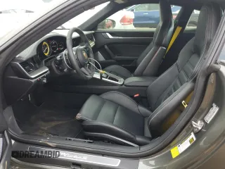 2023 Porsche 911 Turbo z VIN WP0AD2A99PS257416, wystawiony jako Copart lot #54127325 z przebiegiem 7 252 mil mil oraz Szkoda całkowita • Salvage title. Historia ofert i sprzedaży dostępna na DreamBid. Obrazek 7.