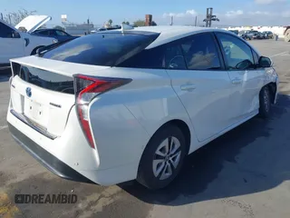 2017 Toyota Prius Two with VIN JTDKBRFU2H3043413, listed as a IAAI auction lot 41719364 with 98,457 mi miles. Bid and sale history available at carsss.com. Image 4.