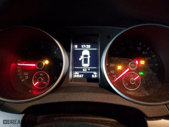 2012 Volkswagen Golf TDI with VIN WVWMM7AJ7CW301002, listed as a Copart auction lot 71893884 with 84,567 mi miles and Salvage Title. Bid and sale history available at carsss.com. Image 9.