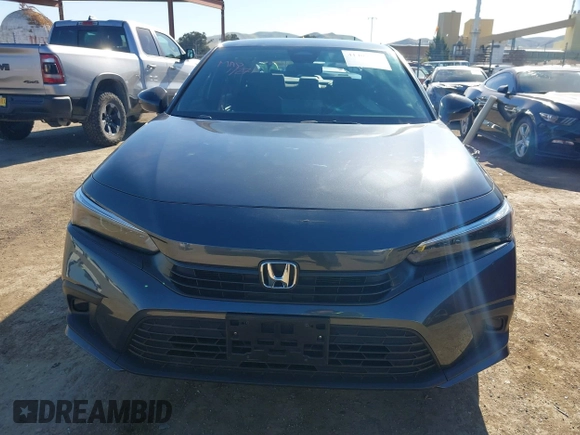 2024 Honda Civic Sport z VIN 2HGFE2F5XRH560239, wystawiony jako IAAI lot #41409263 z przebiegiem 10 030 mil mil oraz . Historia ofert i sprzedaży dostępna na DreamBid. Obrazek 12.