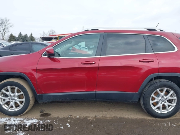 2014 Jeep Cherokee Latitude with VIN 1C4PJMCS2EW175306, listed as a IAAI auction lot 41620115 with 156,578 mi miles and . Bid and sale history available at carsss.com. Image 14.