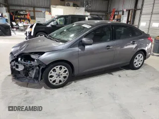 2012 Ford Focus SE z VIN 1FAHP3F28CL444261, wystawiony jako Copart lot #61174145 z przebiegiem 77 612 mil mil oraz Szkoda całkowita • Salvage title. Historia ofert i sprzedaży dostępna na DreamBid. Obrazek 1.