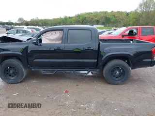 2018 Toyota Tacoma SR with VIN 3TMCZ5AN0JM136198, listed as a IAAI auction lot 41962668 with 71,813 mi miles. Bid and sale history available at carsss.com. Image 14.